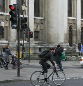 Cyclist running the red Cyclist running the red